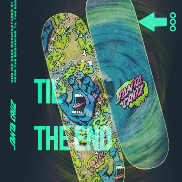 Colorful skateboard deck with graphic design and Santa Cruz branding on a dark background.