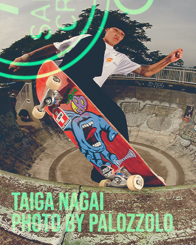 Santa Cruz Youth Clothing - Skateboarder performing a trick with a colorful skateboard at a skate park, featuring the name Taiga Nagai and photographer Palozzolo.
