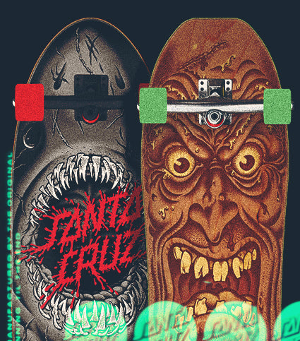 Two Santa Cruz skateboard decks with colorful graphic designs on a dark background.