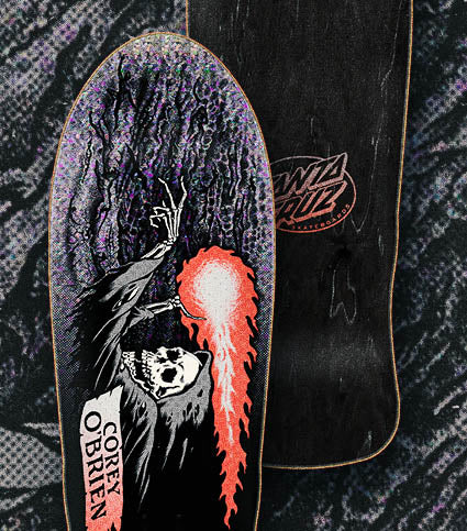 Santa Cruz skateboard deck with a reaper graphic design and 'Corey O'Brien' text on a textured background.